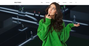 Woman looking toward Waymo’s autonomous-driving visualization, illustrating the company’s planned Toronto robotaxi rollout in 2028.